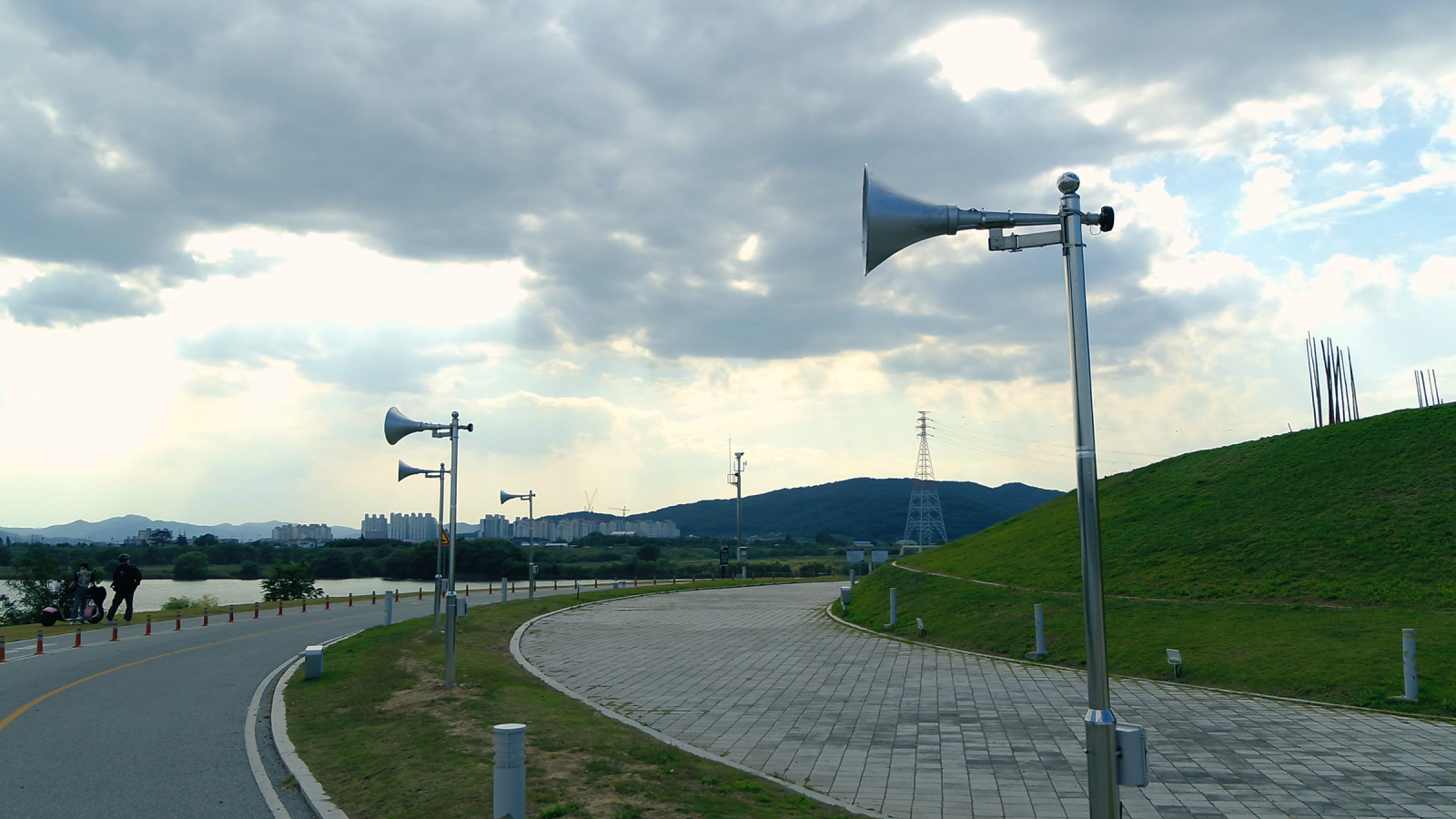 Memory of River, 2022, Speaker mounted on a tall pole, av receiver, Dimensions variable
